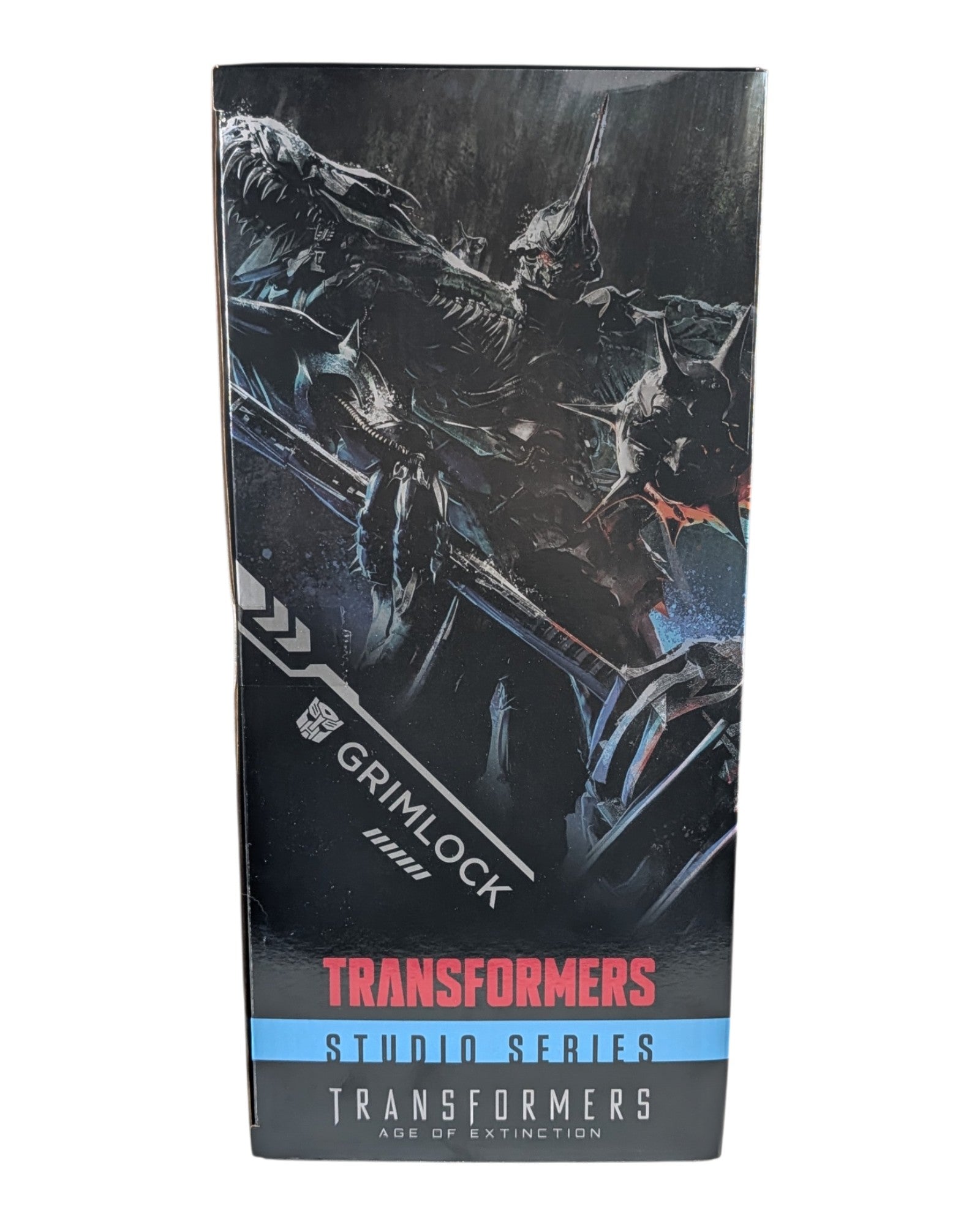 Transformers Studio Series Titan Grimlock (Age of Extinction), Hasbro '26 — left edge of package