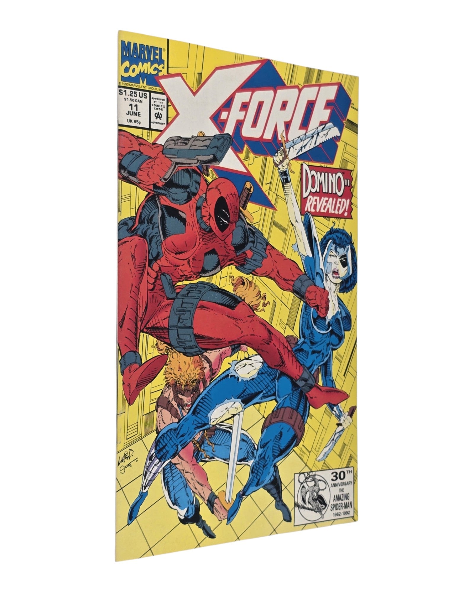 X-Force #11, 1st App. Domino, Marvel '92 — front cover, spine edge
